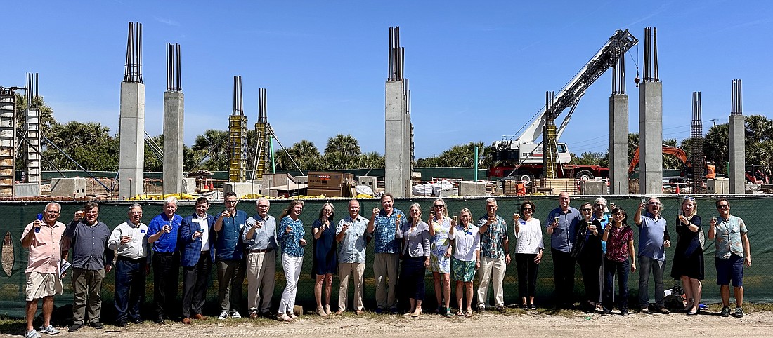 UF provost, Board of Trustees, scientific advisors and Whitney staff and faculty toast the construction in progress. Courtesy photo