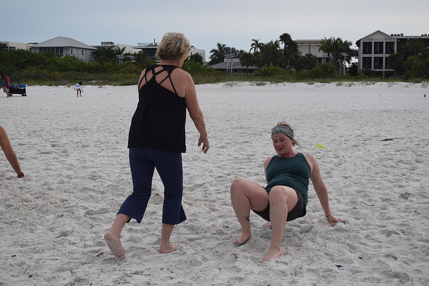Jill Gilfillan Bower and Jamie McDermott-Galles switch off in a relay crab ace.