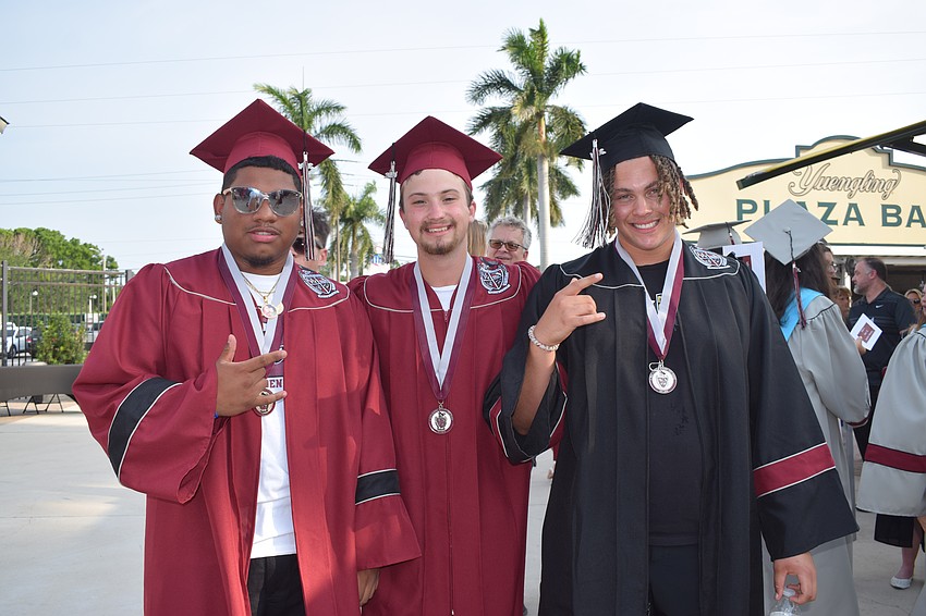 Braden River High's Josiah Nicasio, Connor Infanti and Elliott Parker says it feels great to graduate. 