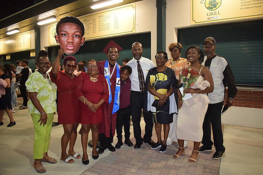 Braden River High graduate Princton Davis celebrates with his family.
