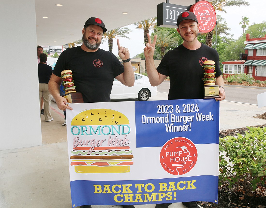 Pumphouse BBQ owner Rob West and Chef Bryan Brymer celebrate their back to back win. Photo by Jarleene Almenas