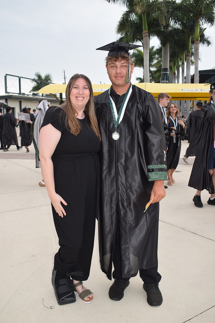 Lakewood Ranch High School's Kelly Smith-Williams congratulates Aidan Silano, whom she has known since his freshman year.