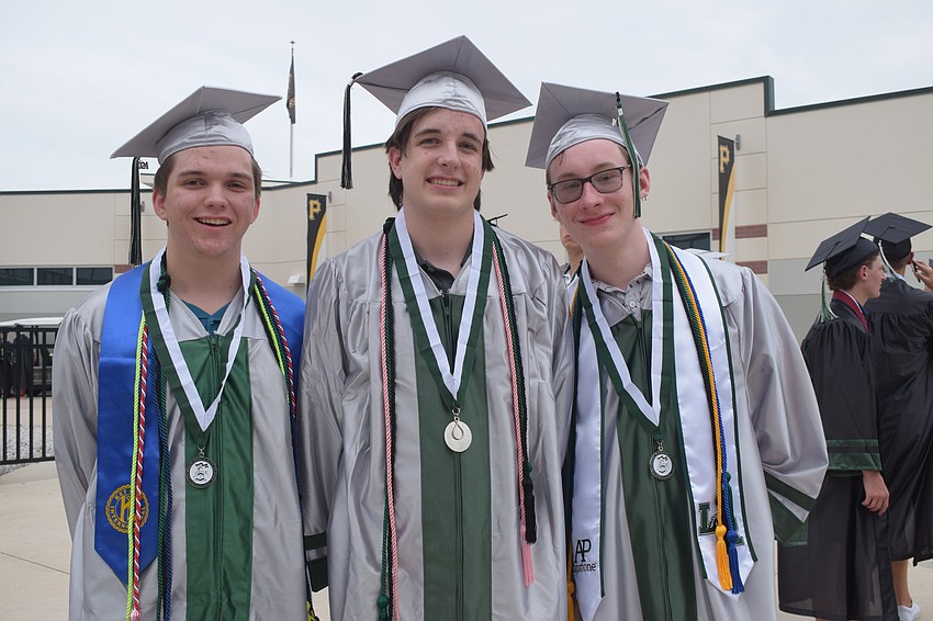 Lakewood Ranch High School's Logan Scott, Logan Catlett and Connor Henning are happy to be done with high school and move onto college.
