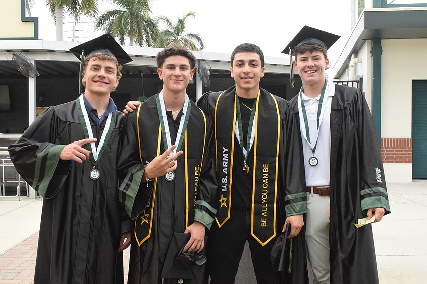 Lakewood Ranch High School's Kieran Dan, Alexander Figueroa, Vincent Vanacore and Conner Snyder are ready to accept their diplomas.