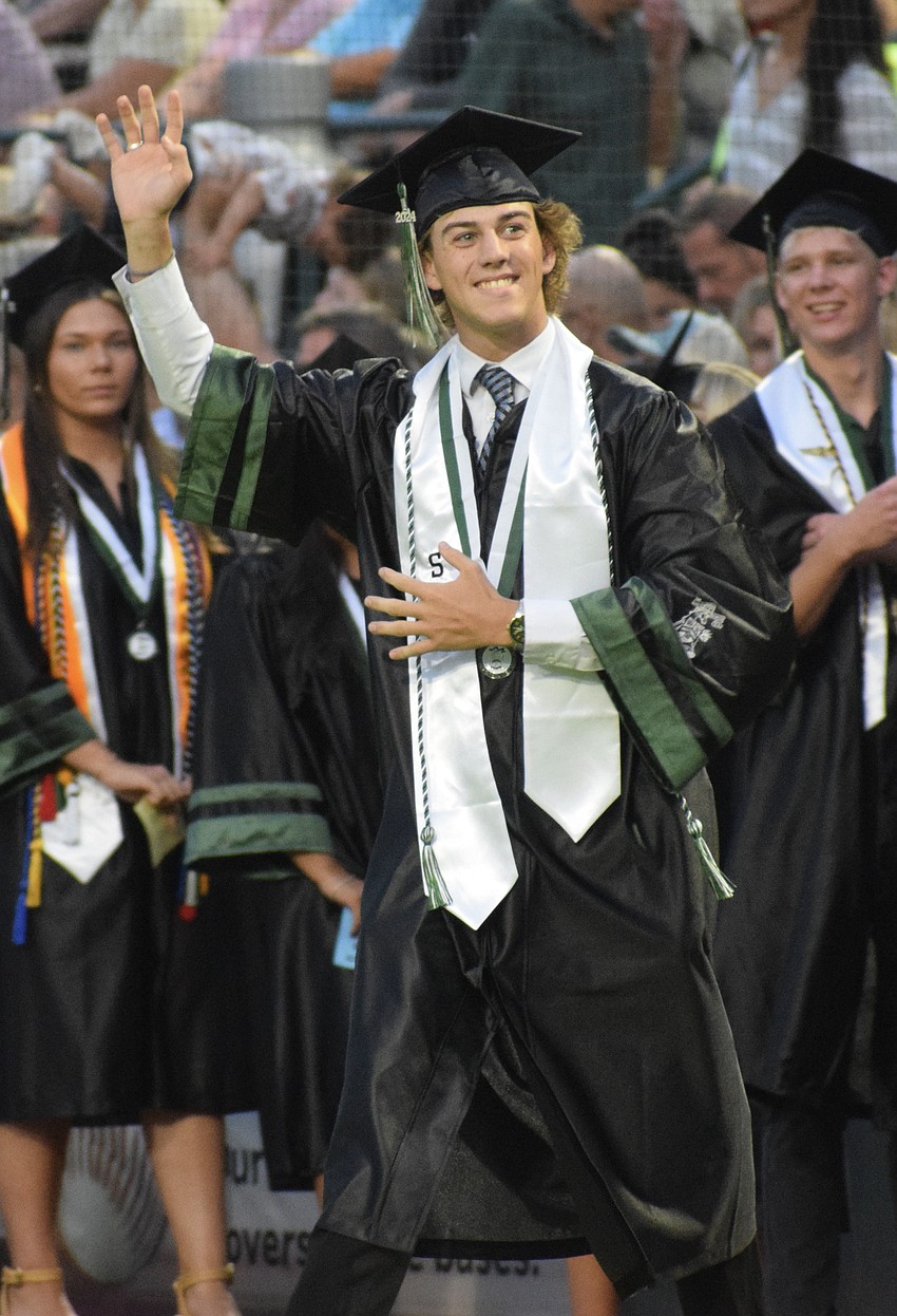 Ryan Donnelly, a Lakewood Ranch High School graduate, waves to his family.