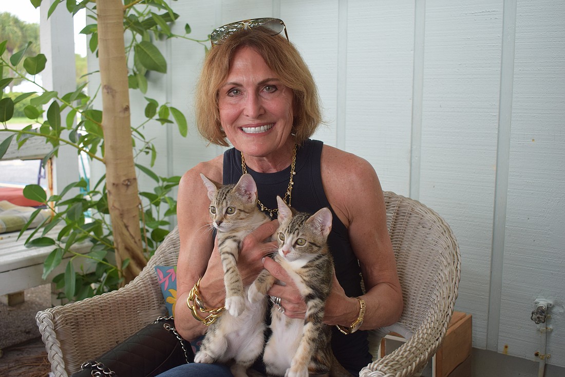 Caryn Wilbraham and her foster kittens Tarporley and Neven
