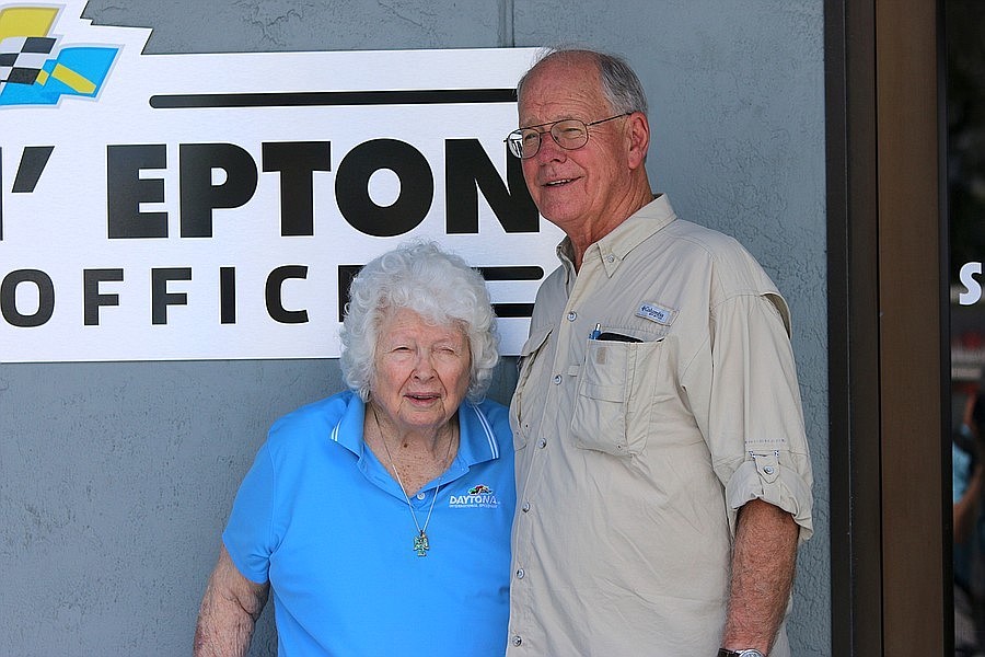 NASCAR CEO Jim France poses with Juanita "Lighnin" Epton on Aug. 25, 2022, in front of the newly named Lightnin' Epton Ticket Office at Daytona International Speedway. File photo by Brent Woronoff