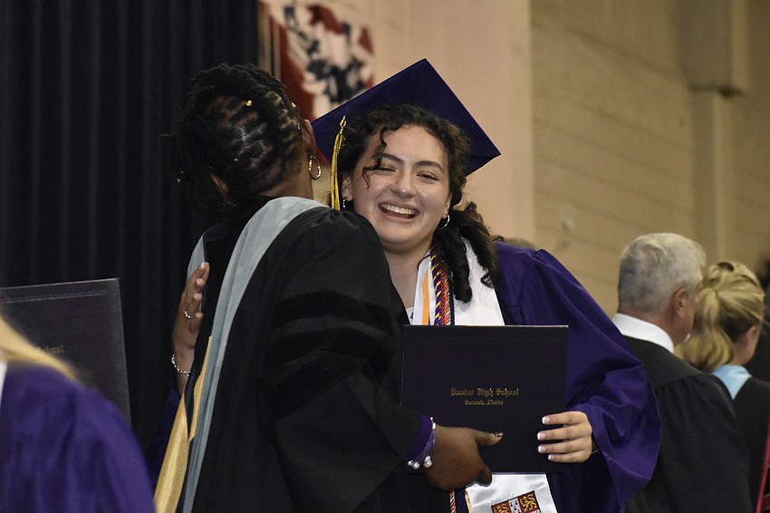 Principal Rachel Shelley greets Amelia Tapia Pulla.