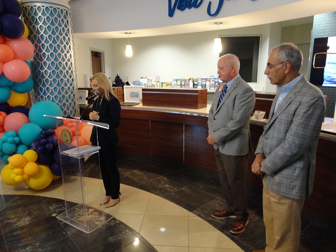 Mayor Donna Deegan, joined by Visit Jacksonville President and CEO Michael Corrigan and City Council President Ron Salem, right, proclaimed May 19-25 National Travel and Tourism Week in Jacksonville.