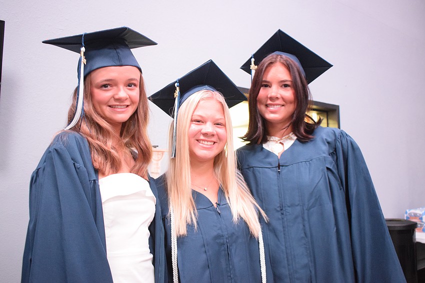 MAdeline Crosby, Abbey Burwood and Olivia Seidensticker say their high school diplomas represent their years of hard work paying off.