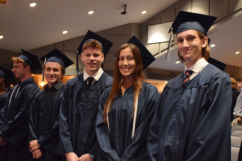 Axl Aparicio-Jerro, Mason Alexander, Rebecca Aguilera and Ryan Abernathy are ready to accept their diplomas.