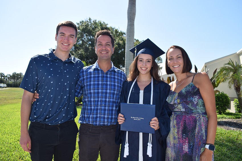 Tyler Calka, Mike Calka, Ashlynn Calka and Erica Calka celebrate Ashlynn Calka's graduation from The Out-of-Door Academy.