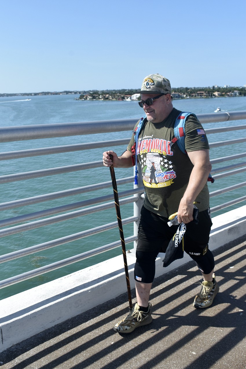Tom Rogers makes his way across the Ringling Causeway.