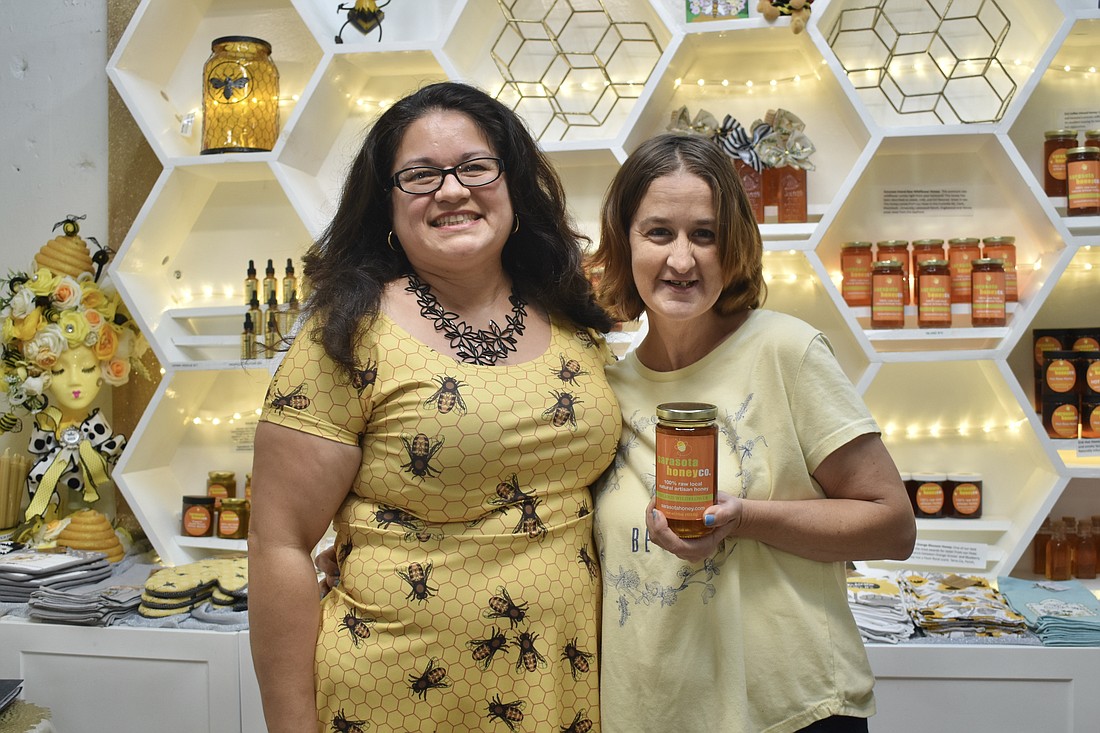 Sarasota Honey Co. owner Alma Johnson and employee Michelle Edwards.