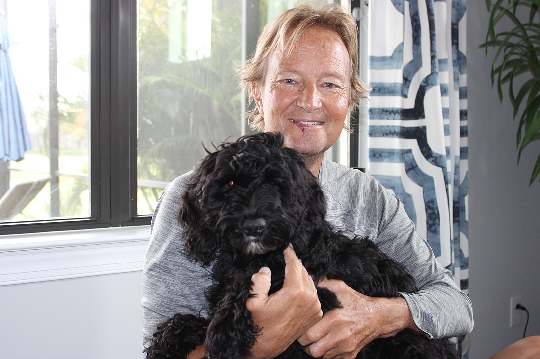 Lakewood Ranch's Rob Rempert said his 15-week-old labradoodle, Madison, has helped keep his spirits up as he hopes for a kidney transplant.