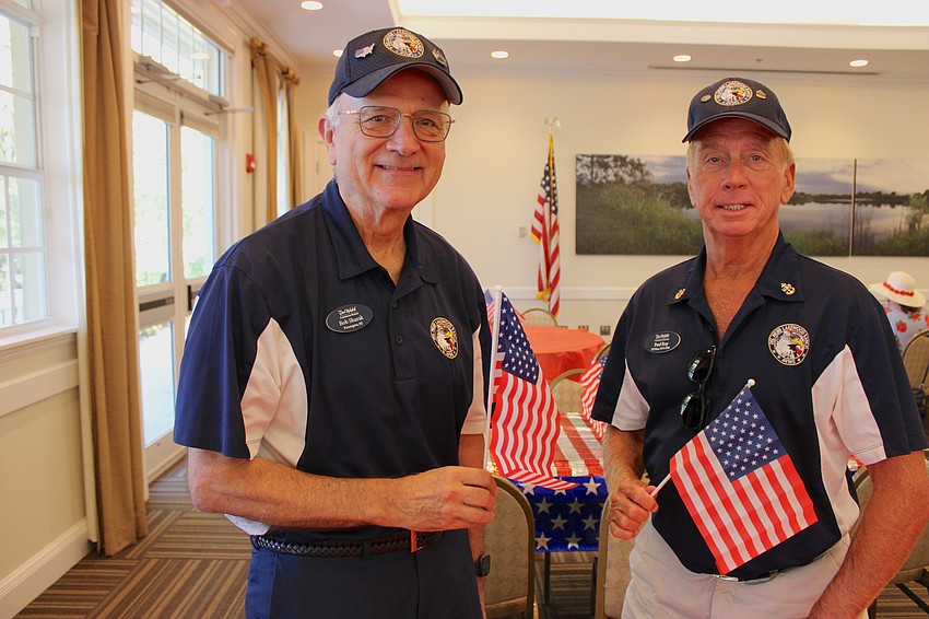 Bob Sharak and Paul Roy of the Del Webb Lakewood Ranch Association of Veterans and Military Supporters enjoy the veterans dinner at Lakewood Ranch Town Hall.