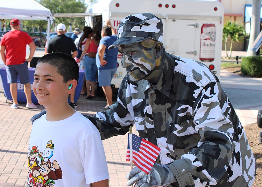 North Port 11-year-old Jovany Ramos gets an unexpected, but fun, visit from street performance artist Joe Abel.