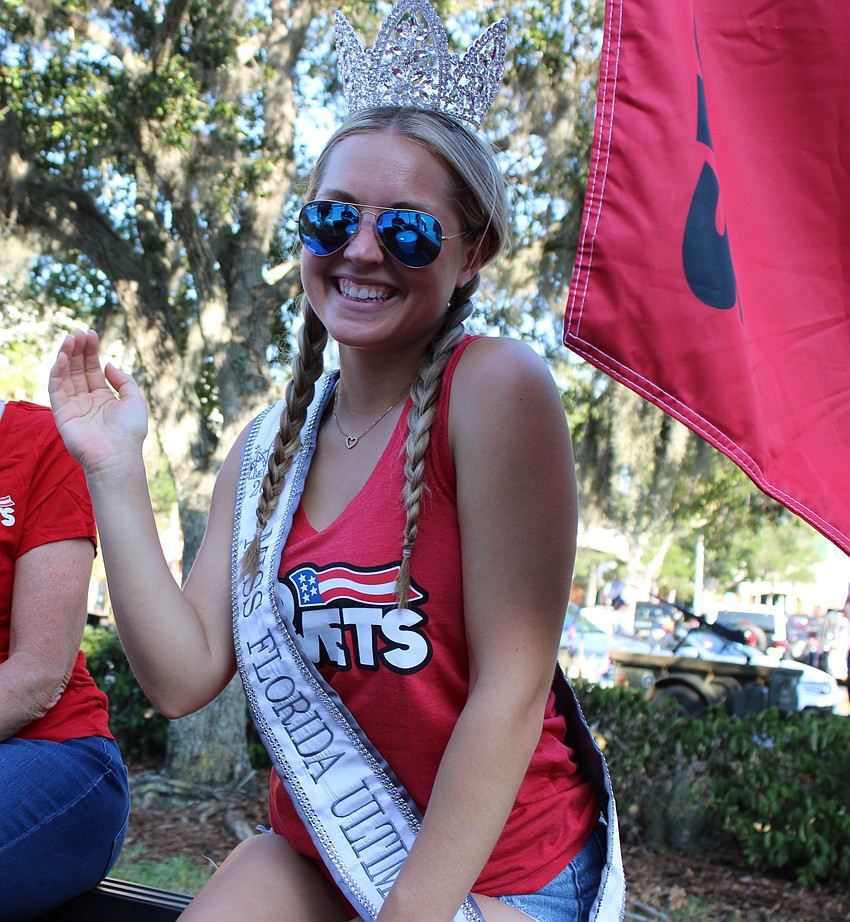 Miss Florida Ultimate Kaitlyn Graybeal, a Lakewood Ranch resident who attends Cardinal Mooney, shows off her wave as she rides in the Tribute to Heroes Parade.