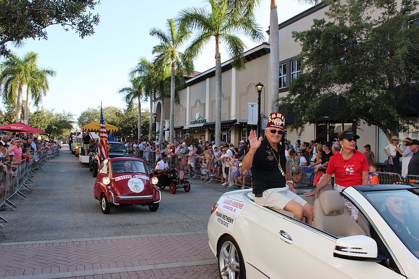 Sahib Shrine's Frank Metheny leads his group's entry in the Tribute to Heroes Parade.