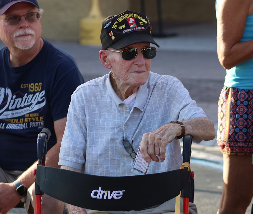 World War II veteran John Skeen, 105, enjoys a front row seat during the Tribute to Heroes Parade.