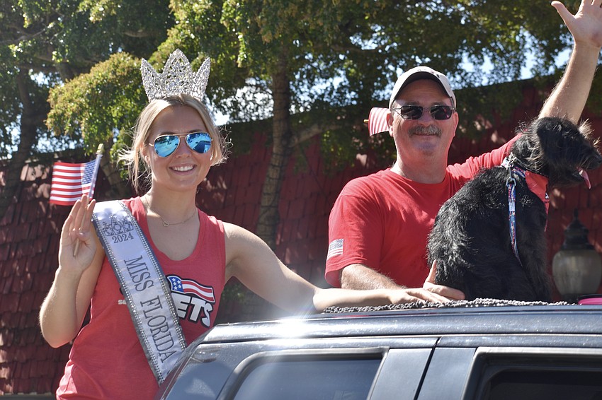 Miss Florida Ultimate Kaitlyn Graybeal rides with SRQ Vets, including board president Rob Kehs.