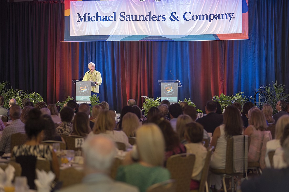 Michael Saunders spoke to 420-plus agents in attendance at the annual meeting of Michael Saunders & Co. at the Hyatt Regency Sarasota.