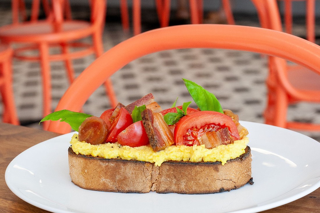 The Bistro in Sarasota Art Museum is offering an Heirloom Tomato and Bacon Tartine with corn and basil as part of its $25 two-course lunch.