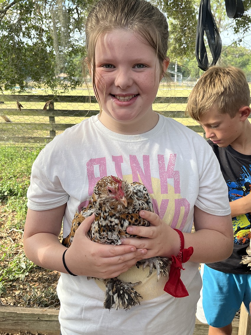 Mary Anne Poulton, who is 9, returns to Junior Ranchers for a second year. She loves being with all the animals and spending time in nature.