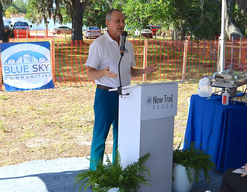 New Trail Plaza developer Blue Sky Communities President Shawn Wilson speaks at the groundbreaking ceremony for the affordable housing community.