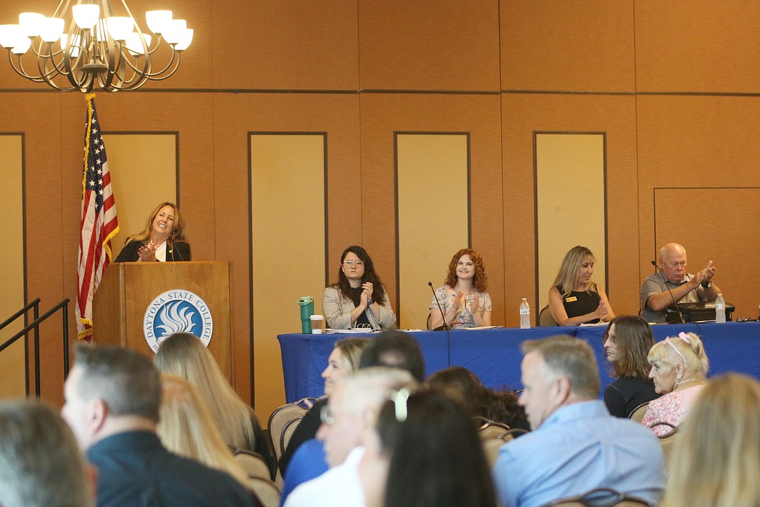 Daytona Beach Area Association of Realtors Government Affairs Chair Jami Gallegos and panelists Jessica Gow, attorney with Cobb Cole; Murphy Kennedy Giering, public policy representative with Florida Realtors;  Shari Simmans, DeBary director of economic development, communications and government affairs; and Jim Morris, Daytona Beach deputy city manager. Photo by Jarleene Almenas