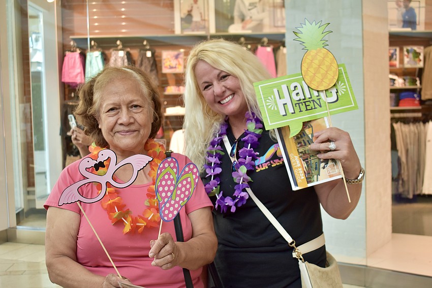 Maria Rosales and Jessica Hall are regulars at the Mall at University Town Center, so they stopped to listen to the music and enjoy the luau on June 7. It brings back nice memories for Rosales, who has visited Hawaii twice.