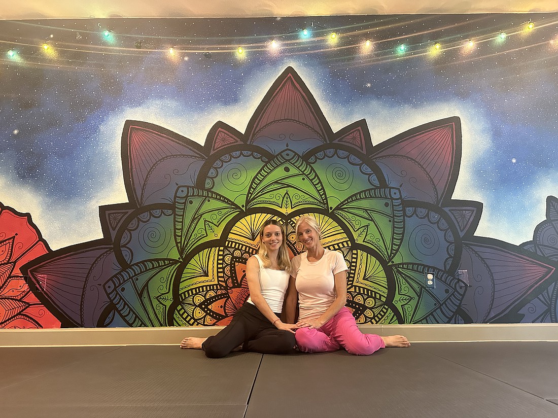 Julie Sanchez, right, has mentored Madi Suarez through her entire yoga teacher journey.