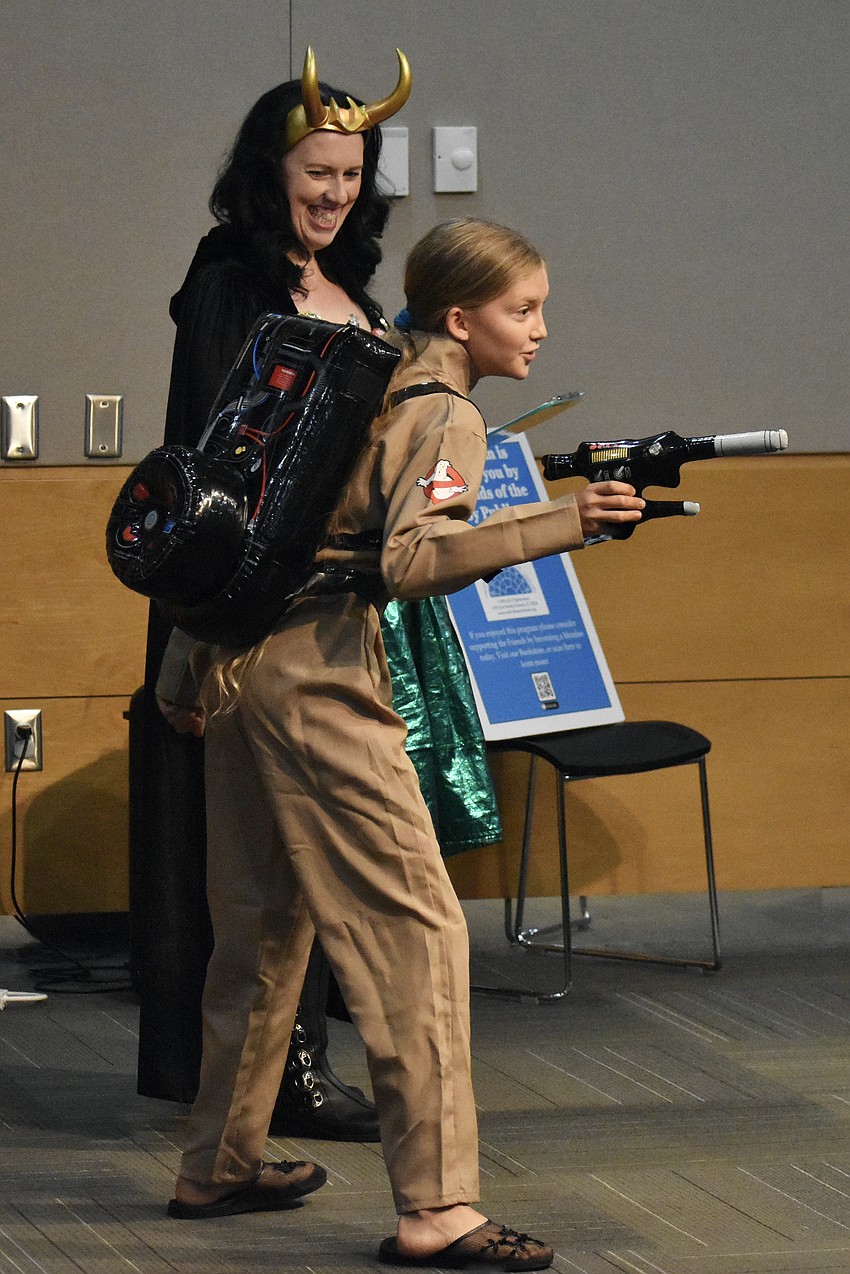 Trinity Lemurian, 13, takes a turn in the costume contest, dressed as a Ghostbuster.