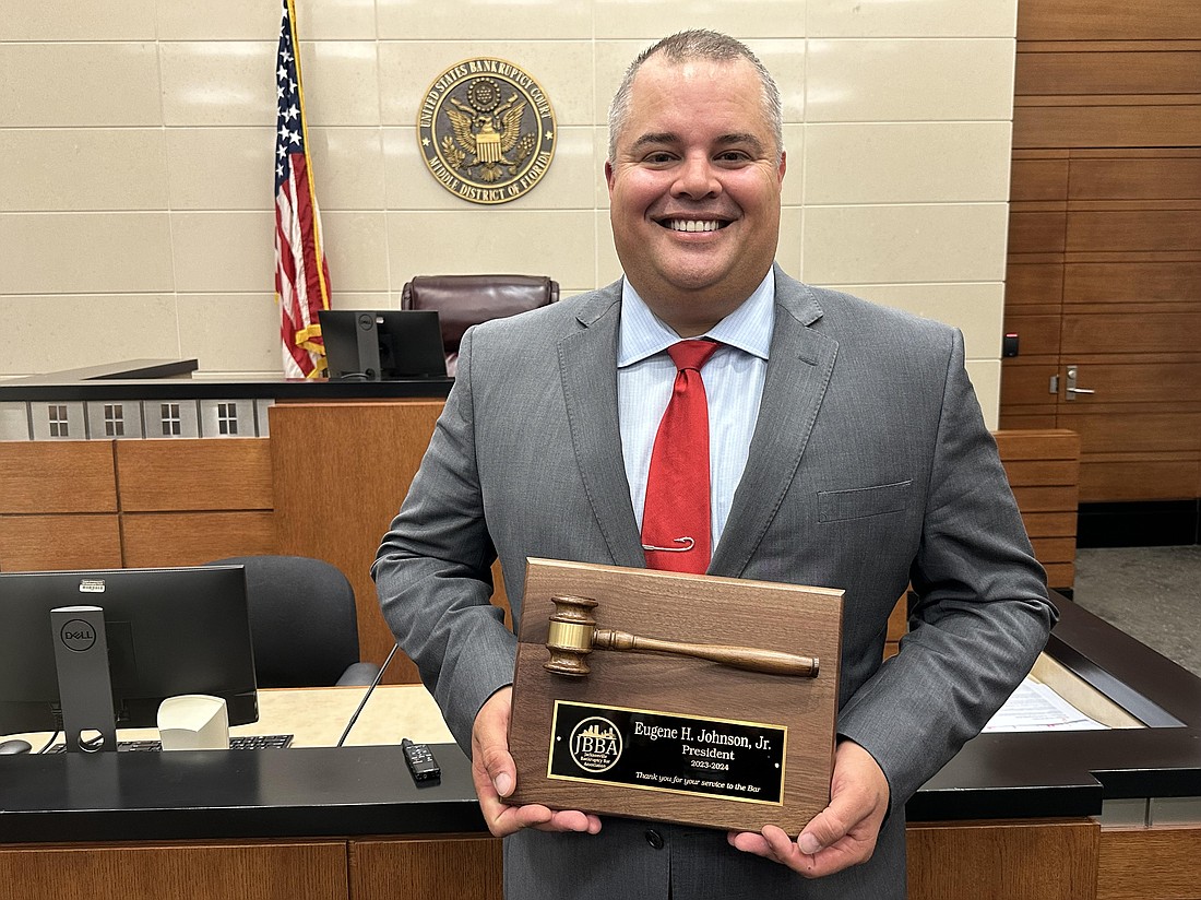 The Jacksonville Bankruptcy Bar Association presented President Eugene Johnson Jr. with a plaque for his 2023-24 leadership.