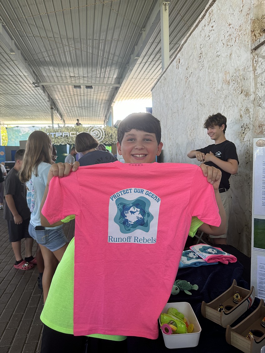 Dalton Jordan's group, the Runoff Rebels, informed attendees about efforts to stop toxic runoff.