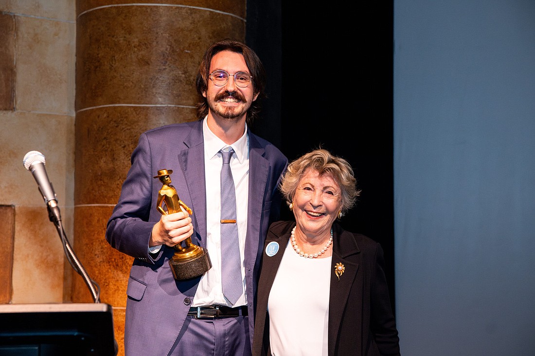 Ringling College of Art and Design student Matthew Peterson, winner of the first Ringling College Film Carl Foreman award, and Foreman's widow, Eve Williams-Jones.