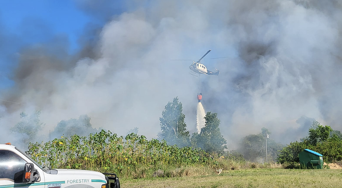 Florida Forest Service enlisted its helicopters to help extinguish the May 30 fire in Lake County.