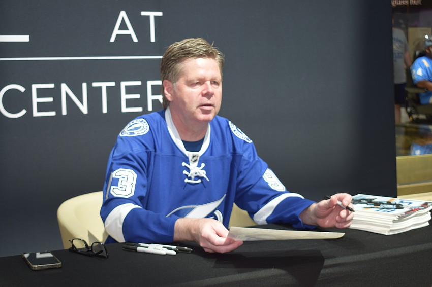 Daren Puppa, who played for the Tampa Bay Lightning from 1993 to 2000, is ready to sign autographs at Dad's Day Block Party.