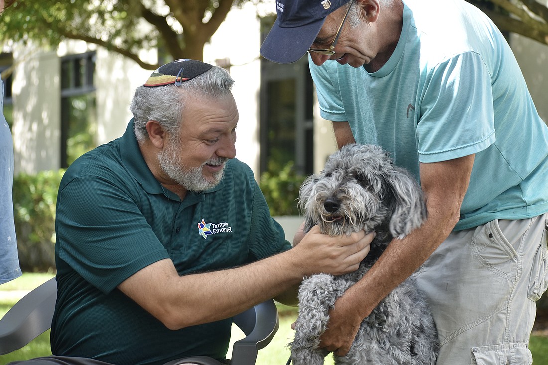 Rabbi Michael Shefrin meets Gracie, and Craig Serota.