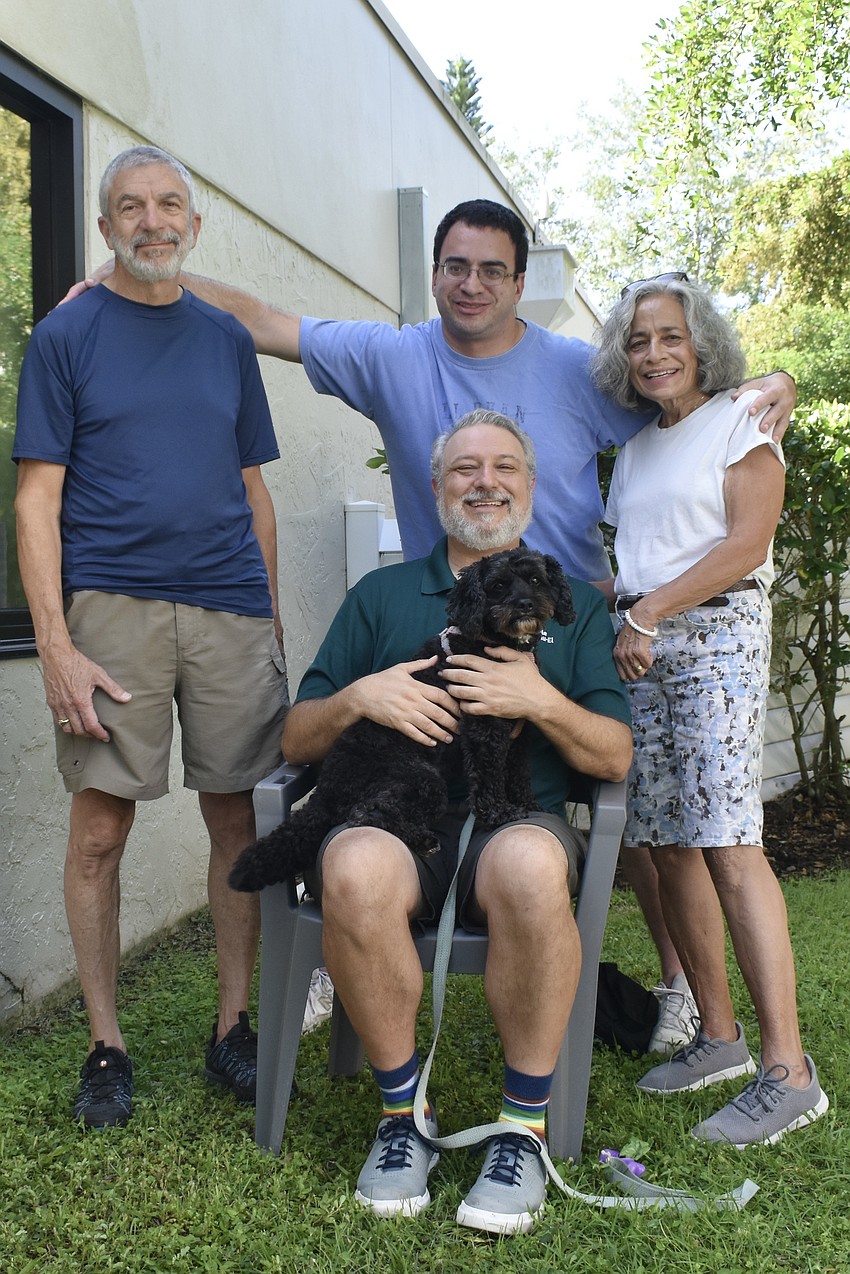 Ken Gold, his son Geoffrey Gold, Rabbi Michael Shefrin, Ken's wife Janis Gold during the blessing for Jake