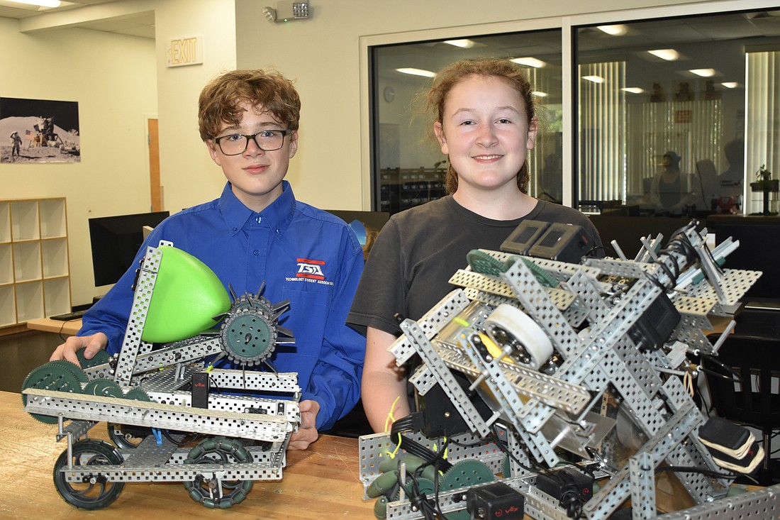 McIntosh Middle School students Kuba Mohrbacher and Anna Dulovich participated in a robotics competition with the Technology Student Association.