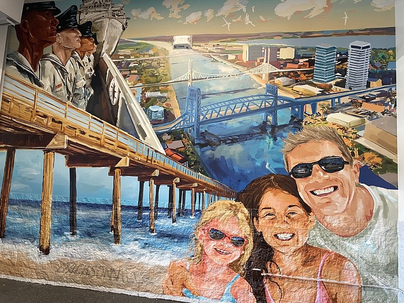 The new mural at the Walmart Supercenter at 13490 Beach Blvd., designed and illustrated by artist Daniel Smith, reflects Jacksonville and its coastal heritage.
