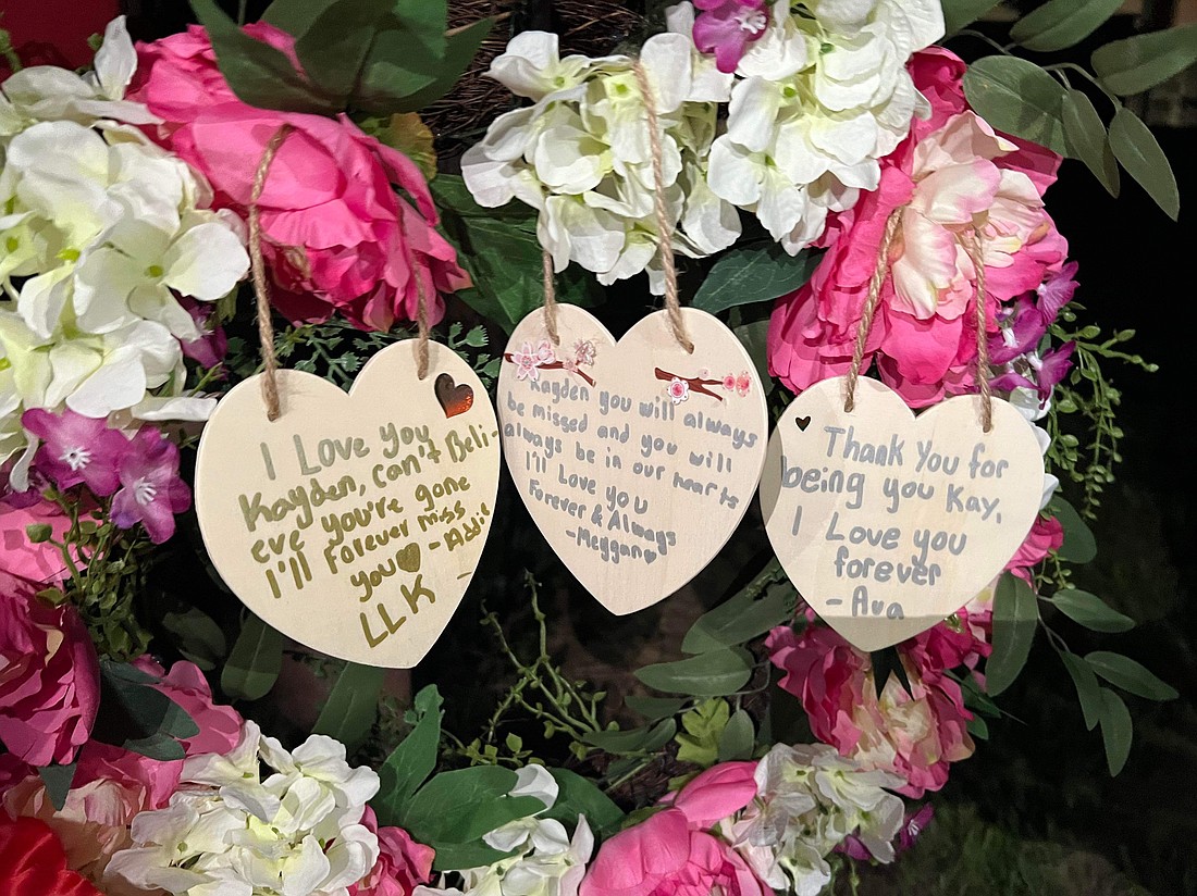 A memorial honoring Kayden Avera is set up near the fire station on Reams Road in Horizon West.