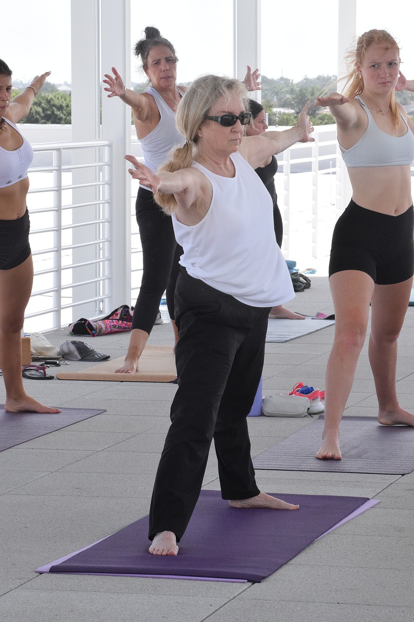 Sweetwater's Suzi Regulski goes into warrior pose.