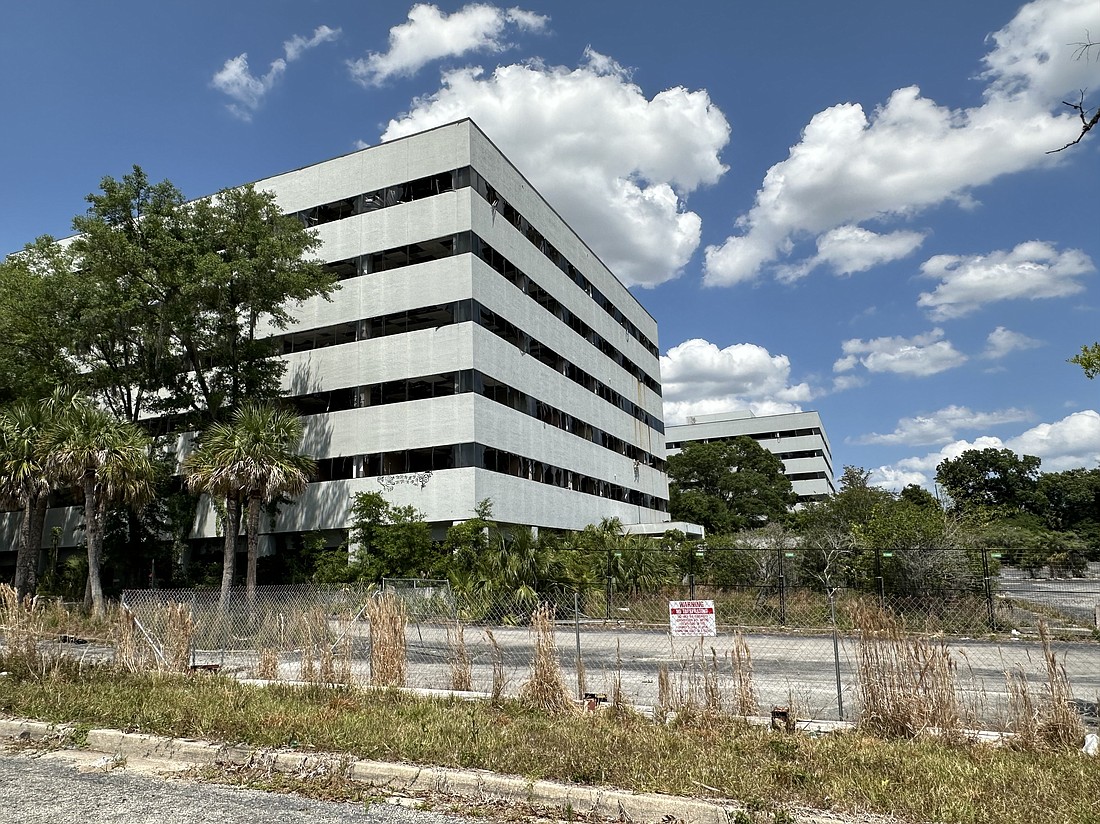 The closed former Offshore Power Systems buildings are part of a 16.2-acre site along the south side of the Arlington Expressway that a developer wants to convert into apartments. The property is about 5 miles east of Downtown.