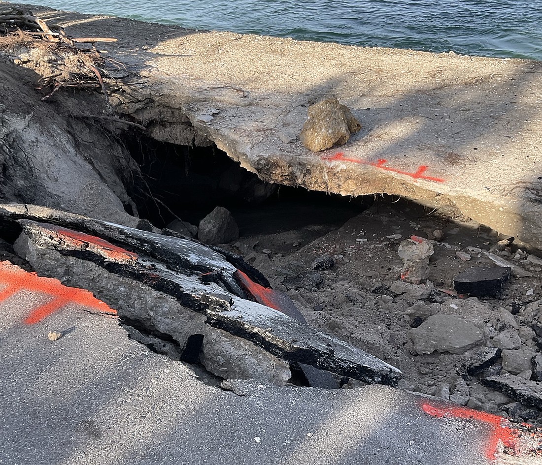 A section of N. Casey Key Road collapsed June 20, county officials say, after torrential rains the week before.