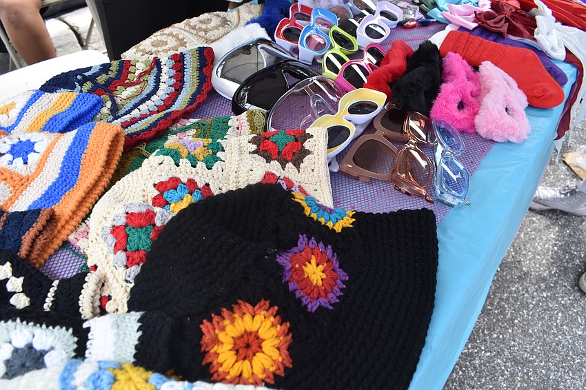 Hats and other apparel are for sale at Boujie Necessities.