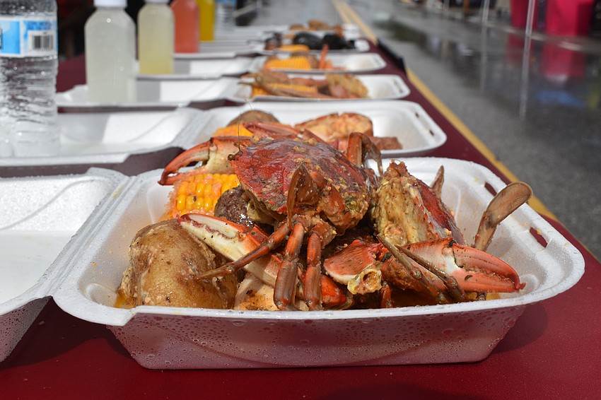 Meals from Stroke's Seafood are on display.
