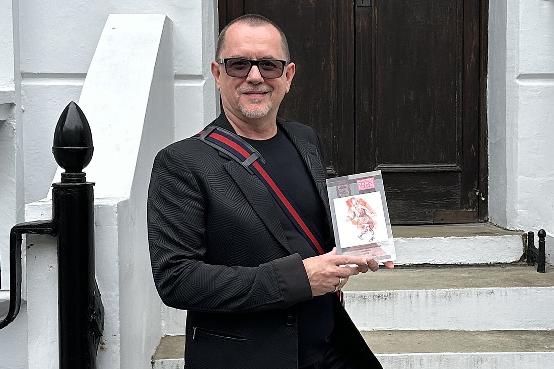 Sarasota Ballet Director Iain Webb displays the National Dance Award for Outstanding Achievement that he received in London on June 3.