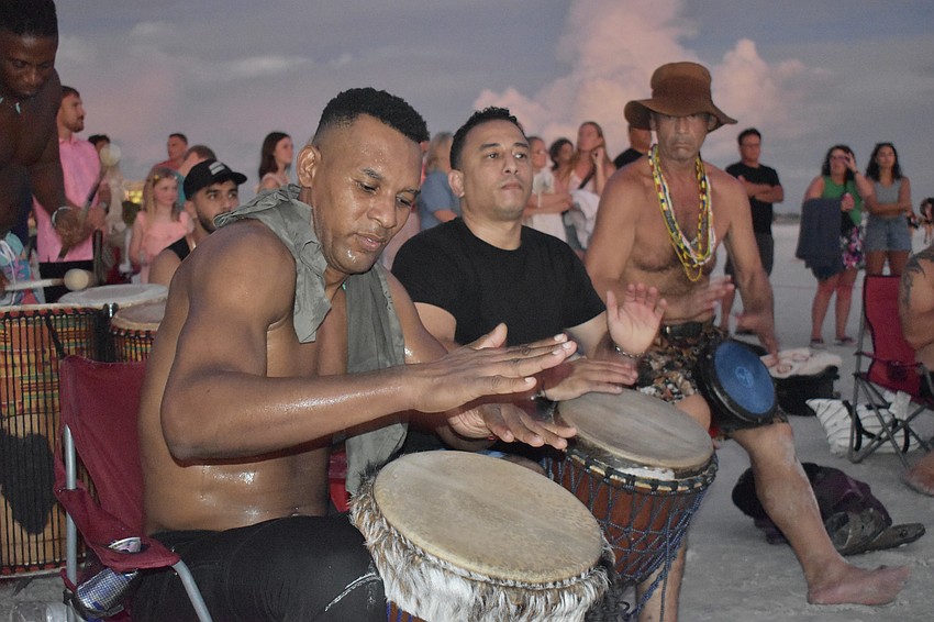 Ziad Mhamdi, Hernando Bueno and Alex Moustaquin play the drums.
